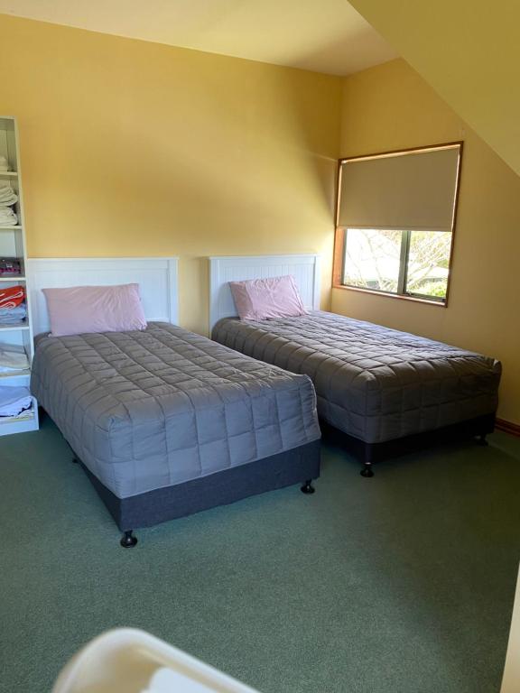 Postel nebo postele na pokoji v ubytování Abel Tasman Marahau