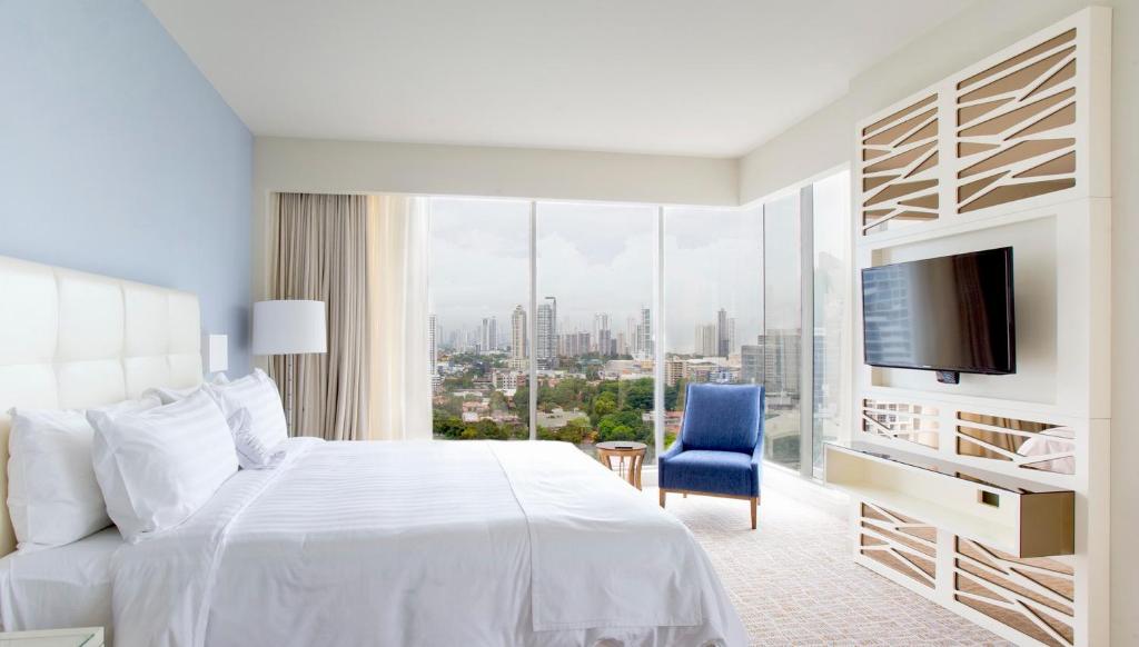 Postel nebo postele na pokoji v ubytování Global Hotel Panama
