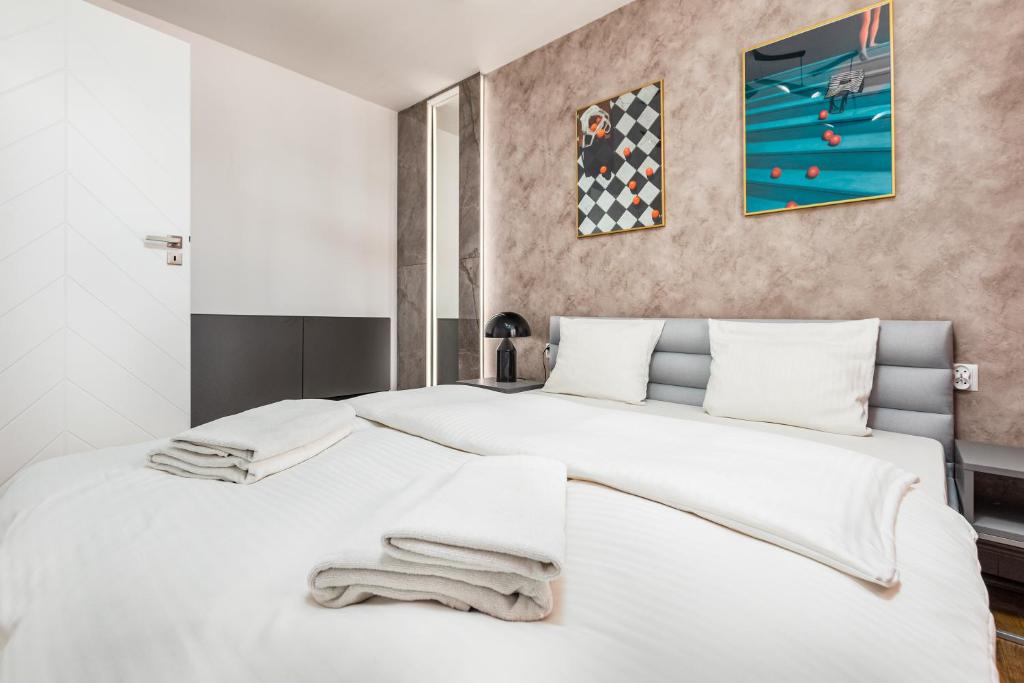 Posteľ alebo postele v izbe v ubytovaní Apartament Moniuszki by Your Freedom
