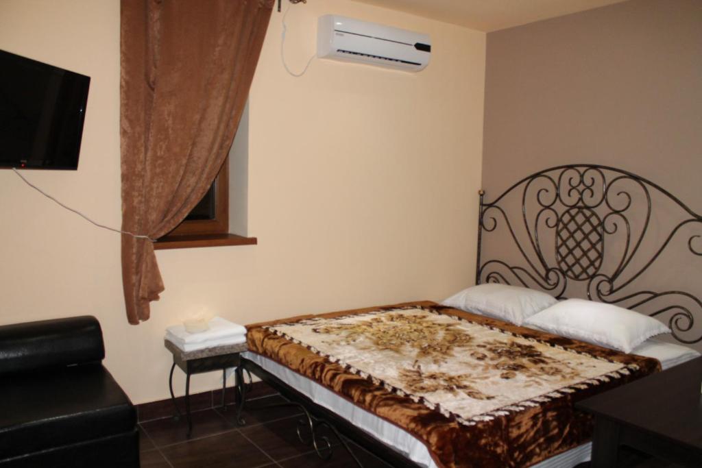 Postel nebo postele na pokoji v ubytování Princ Plaza Hotel
