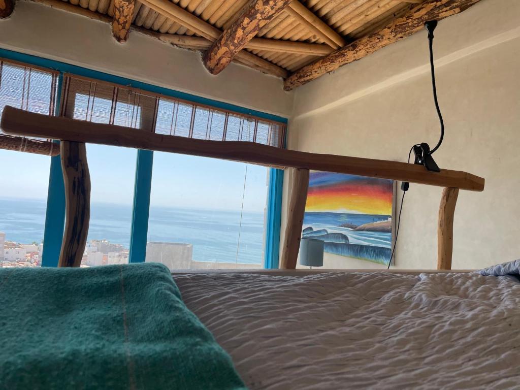 Postel nebo postele na pokoji v ubytování Taghazout Ocean View