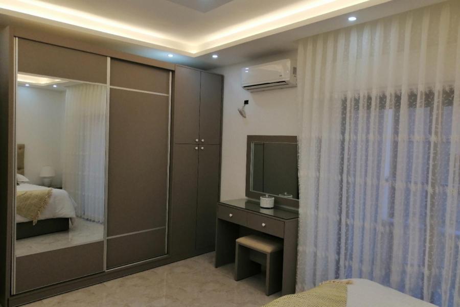 Postel nebo postele na pokoji v ubytování Executive Apartments