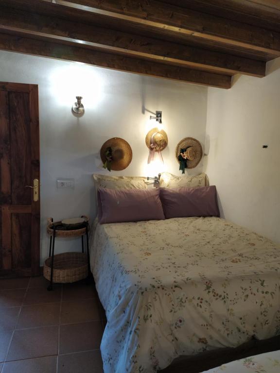 A bed or beds in a room at Casa Eremia