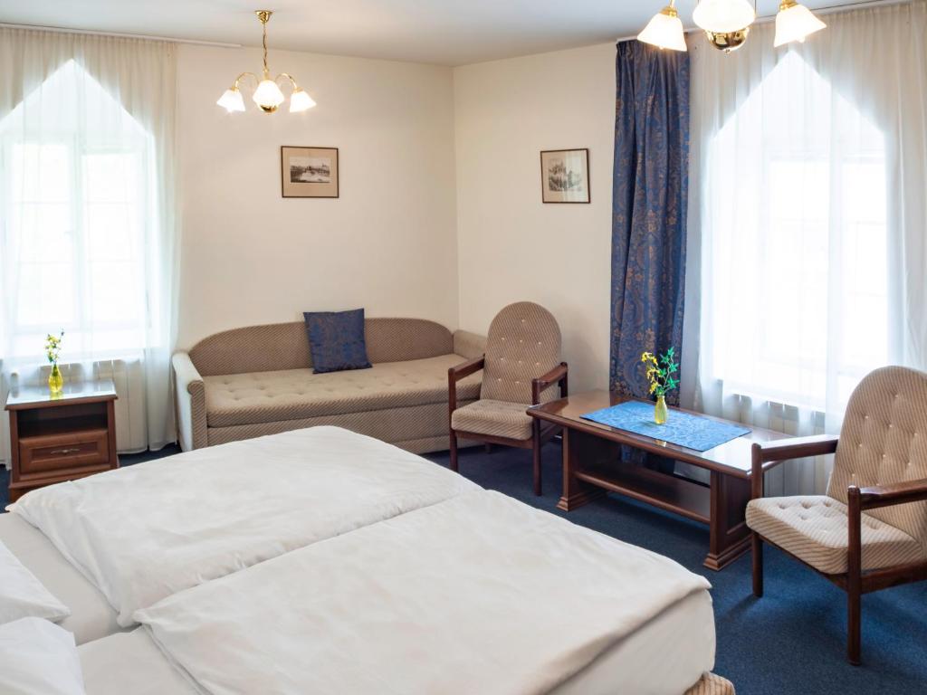 Postel nebo postele na pokoji v ubytování EA Apartmány Mozart