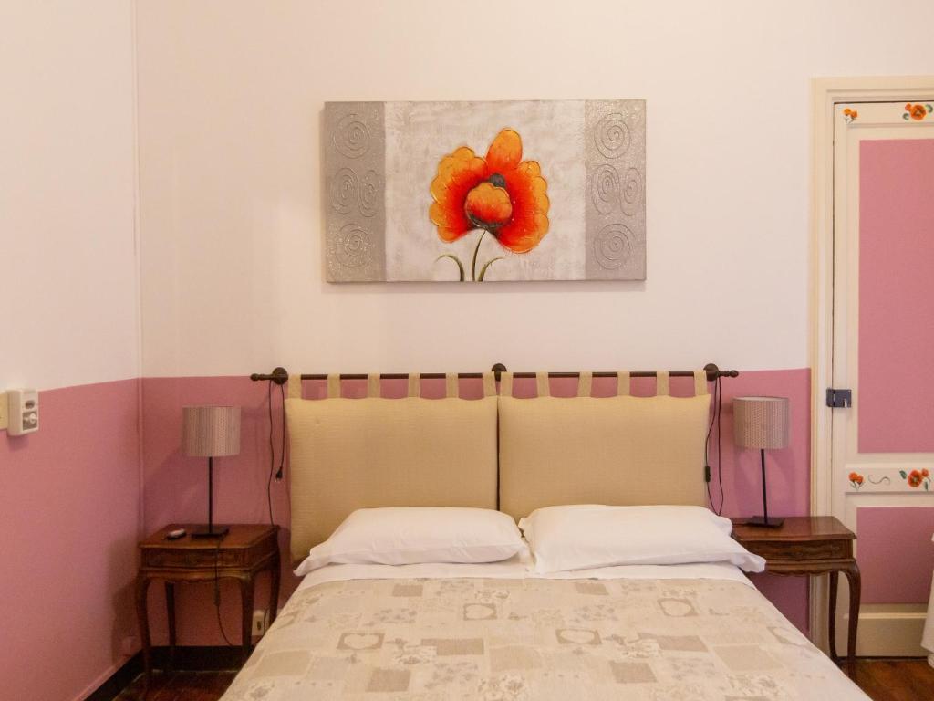 Postel nebo postele na pokoji v ubytování Hotel Portofino