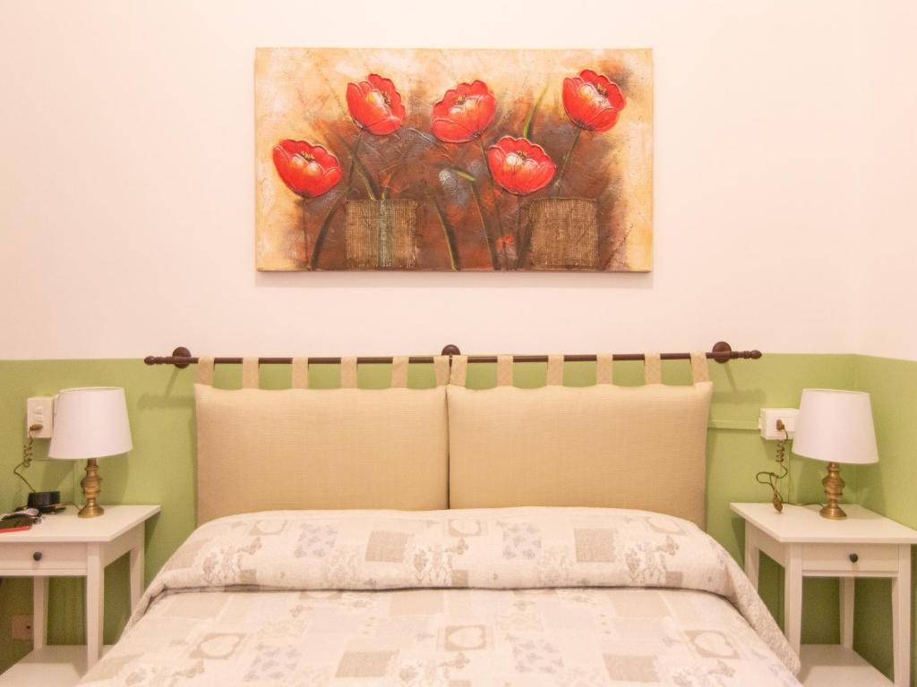Postel nebo postele na pokoji v ubytování Hotel Portofino