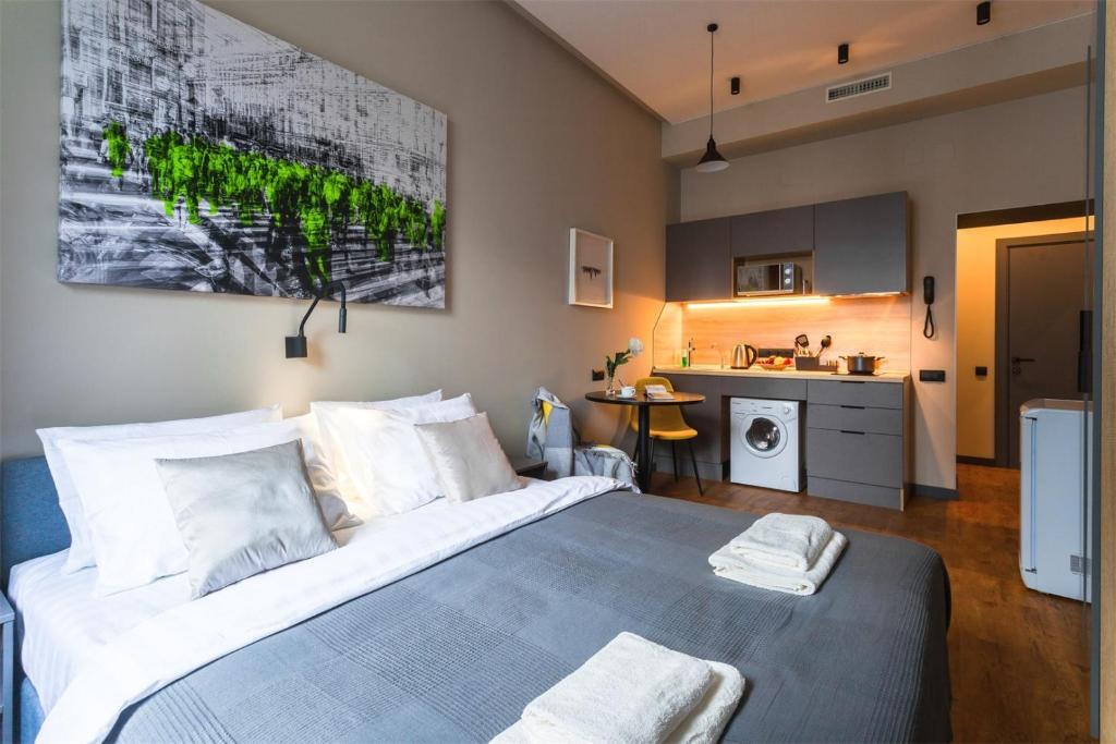 מיטה או מיטות בחדר ב-Grani Aparthotel