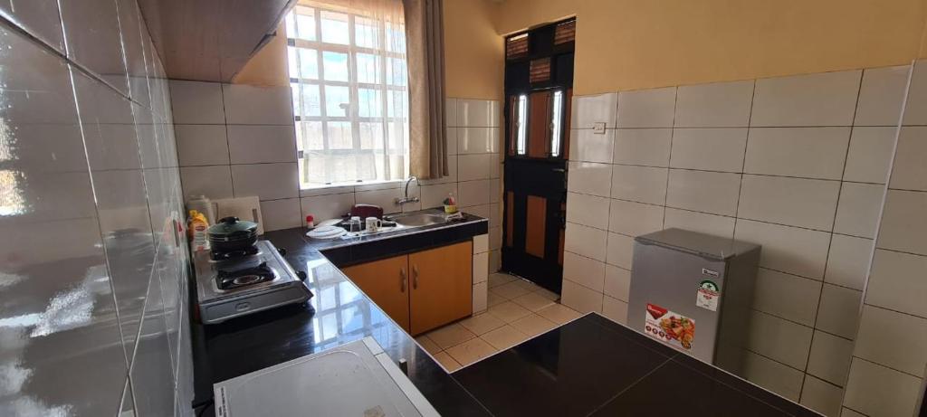 Kuchyň nebo kuchyňský kout v ubytování Desa Homes