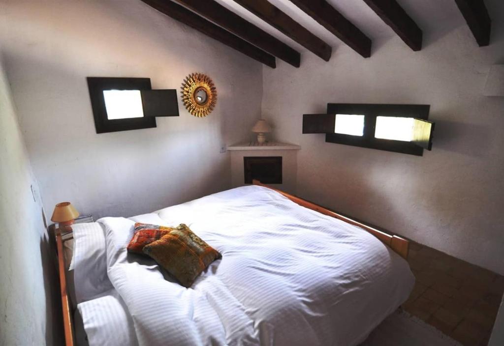Postel nebo postele na pokoji v ubytování Finca Los Monteros