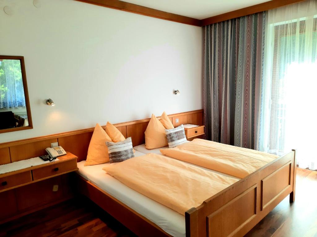 Łóżko lub łóżka w pokoju w obiekcie Apartments Edenhof