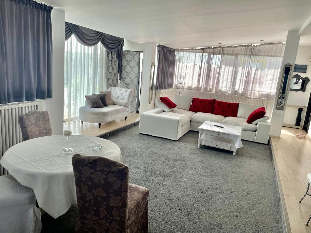 Posezení v ubytování Hotel Jolie Apartments