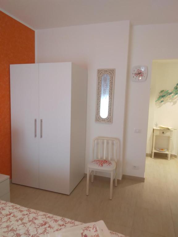 Postel nebo postele na pokoji v ubytování L'approdo