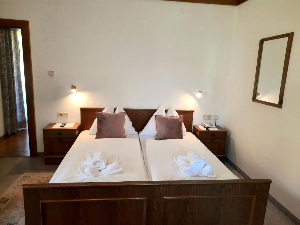 Łóżko lub łóżka w pokoju w obiekcie Apartments Edenhof