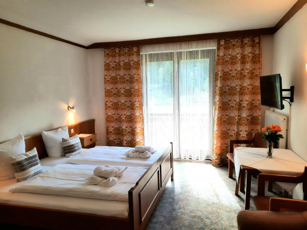 Łóżko lub łóżka w pokoju w obiekcie Apartments Edenhof