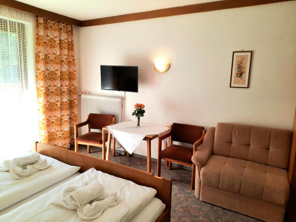 Łóżko lub łóżka w pokoju w obiekcie Apartments Edenhof