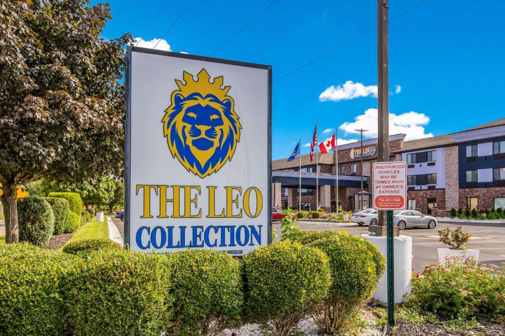 a sign for the leo collection in a street at The Leo Collection Detroit, Ascend Hotel Collection in Lincoln Park