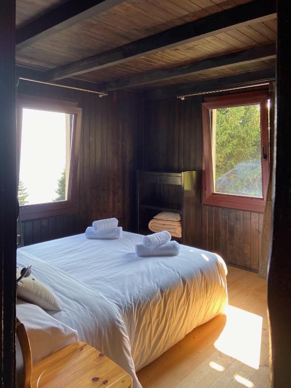 Postel nebo postele na pokoji v ubytování Do-Minus Boutique Home & Private SPA Cà Pedrot Mountain Cottage