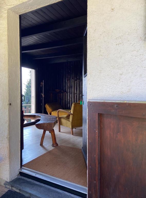 Posezení v ubytování Do-Minus Boutique Home & Private SPA Cà Pedrot Mountain Cottage