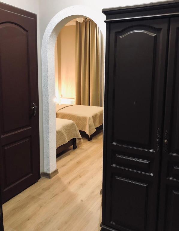 Postel nebo postele na pokoji v ubytování Atlant Hotel