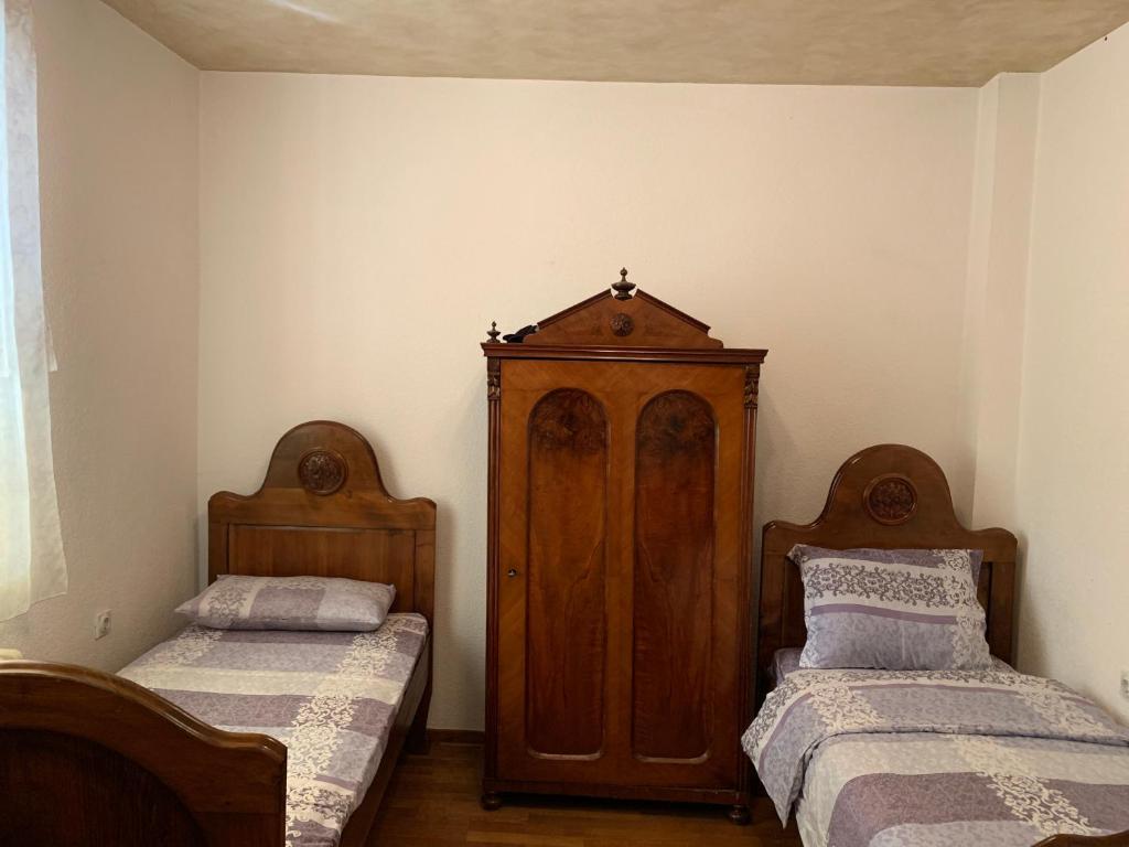 Postel nebo postele na pokoji v ubytování Domaćinstvo Bakić