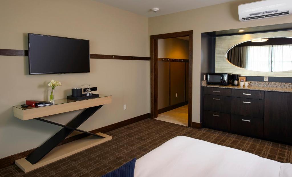 TV a/nebo společenská místnost v ubytování Tetherow Hotel