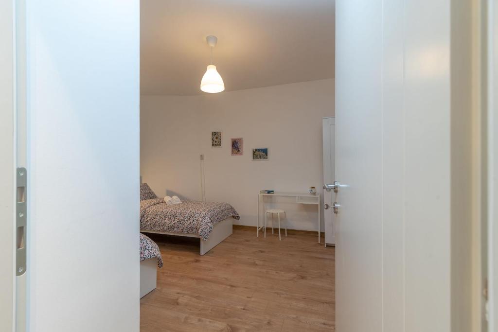 Posteľ alebo postele v izbe v ubytovaní House POLUS