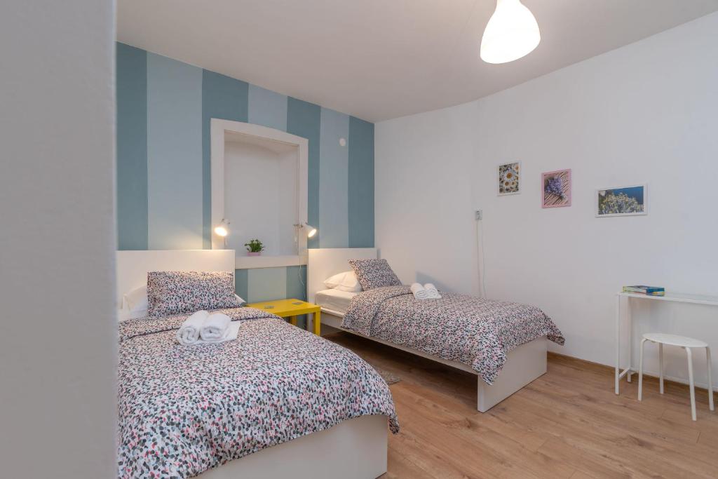 Posteľ alebo postele v izbe v ubytovaní House POLUS