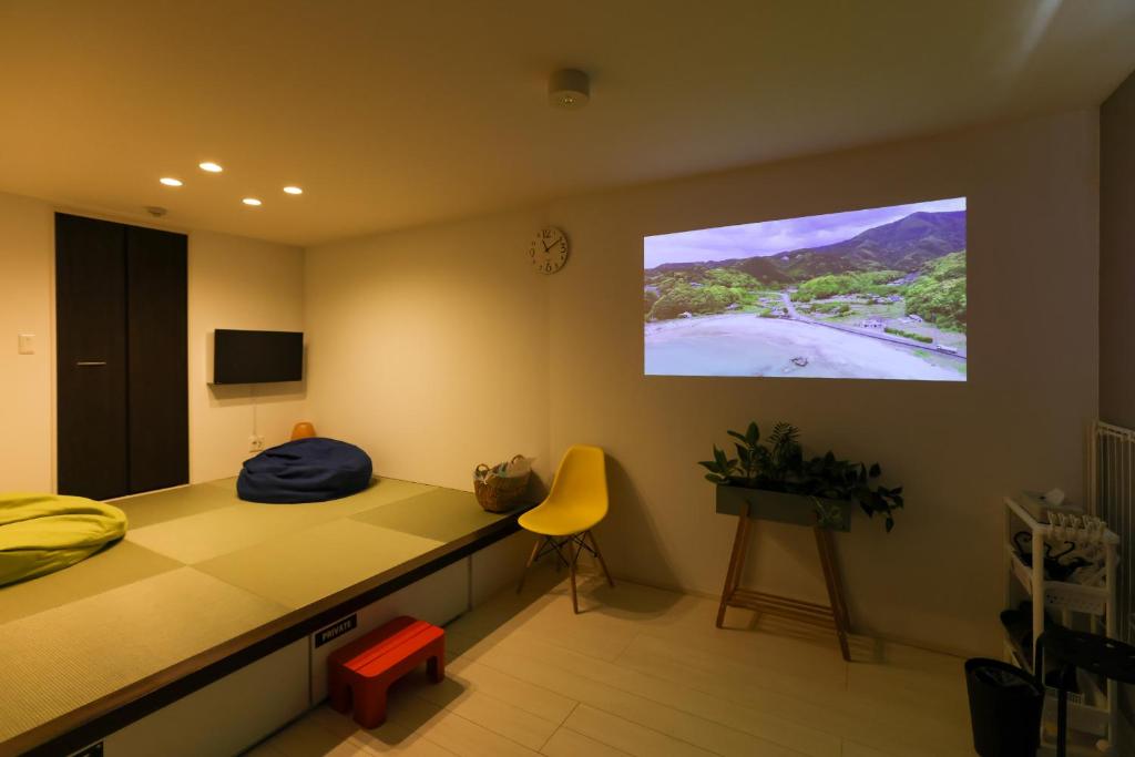TV a/nebo společenská místnost v ubytování ゲストハウス岐阜羽島心音 Guest House Gifuhashima COCONE