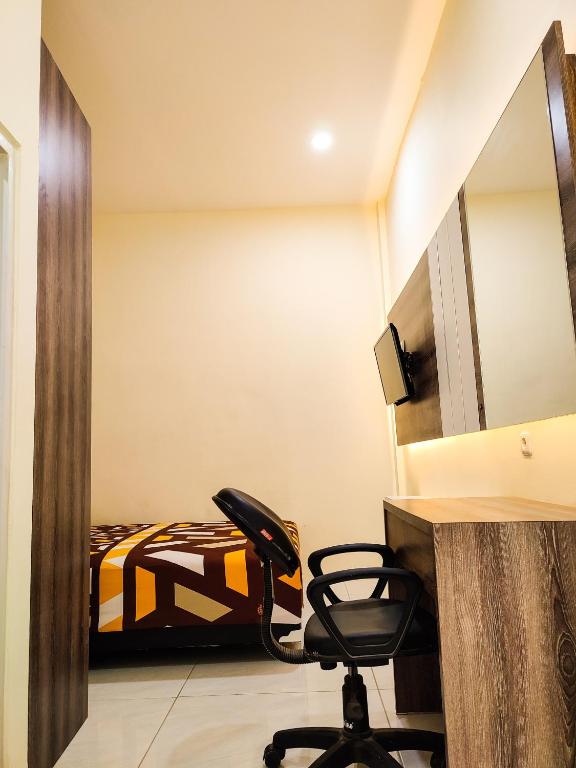 Postel nebo postele na pokoji v ubytování La Tana Hotel