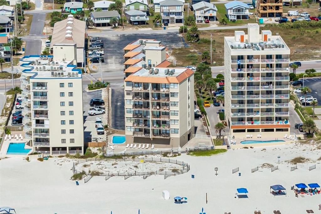 an aerial view of a resort with a beach and buildings at Gulf House II in Gulf Shores