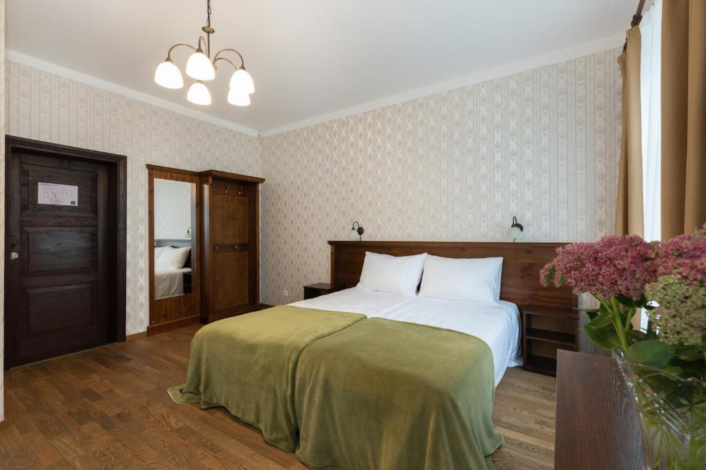 Postel nebo postele na pokoji v ubytování Verevi Motel