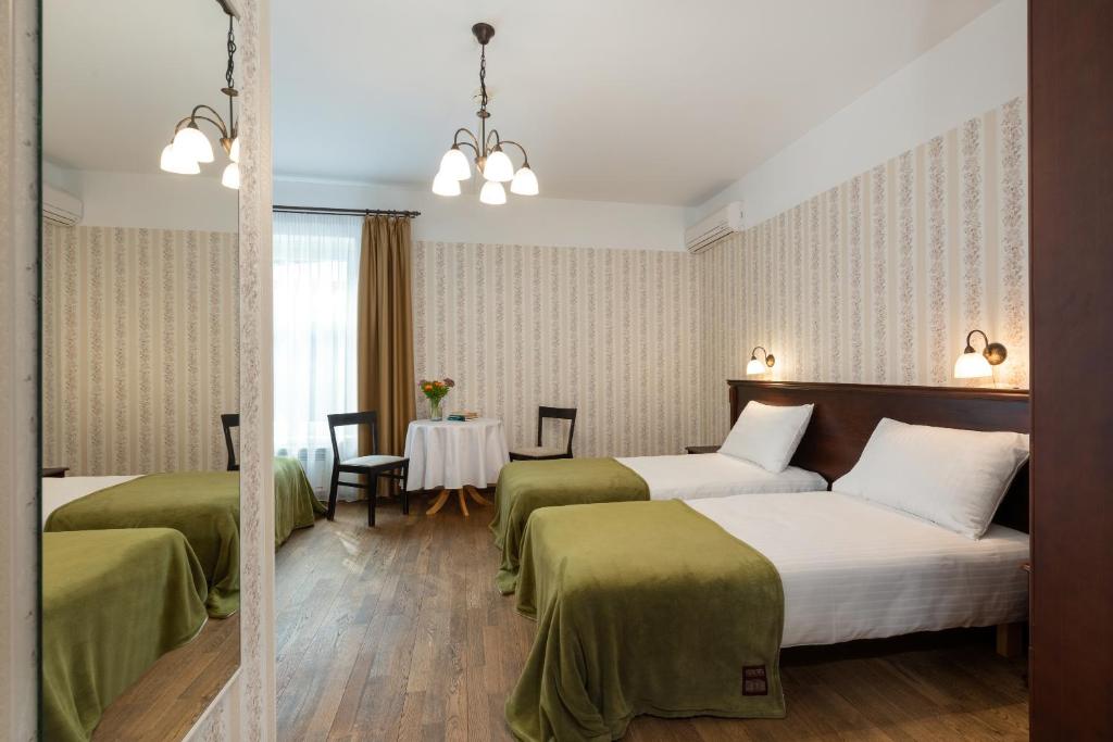 Postel nebo postele na pokoji v ubytování Verevi Motel