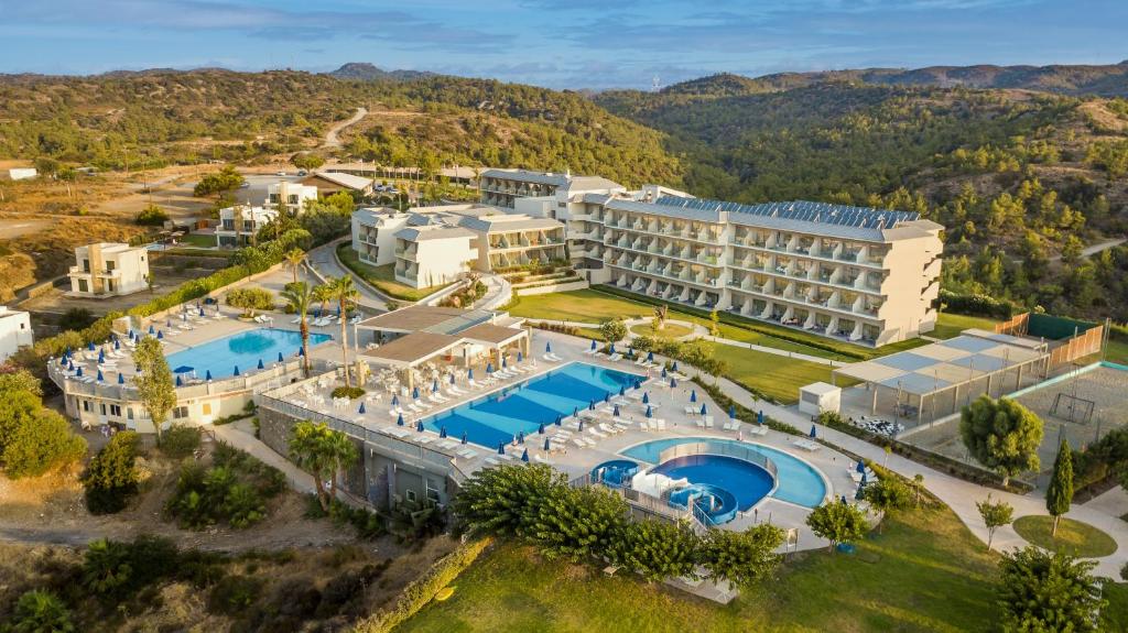 an aerial view of a resort with a swimming pool at Princess Sun Hotel in Kiotari