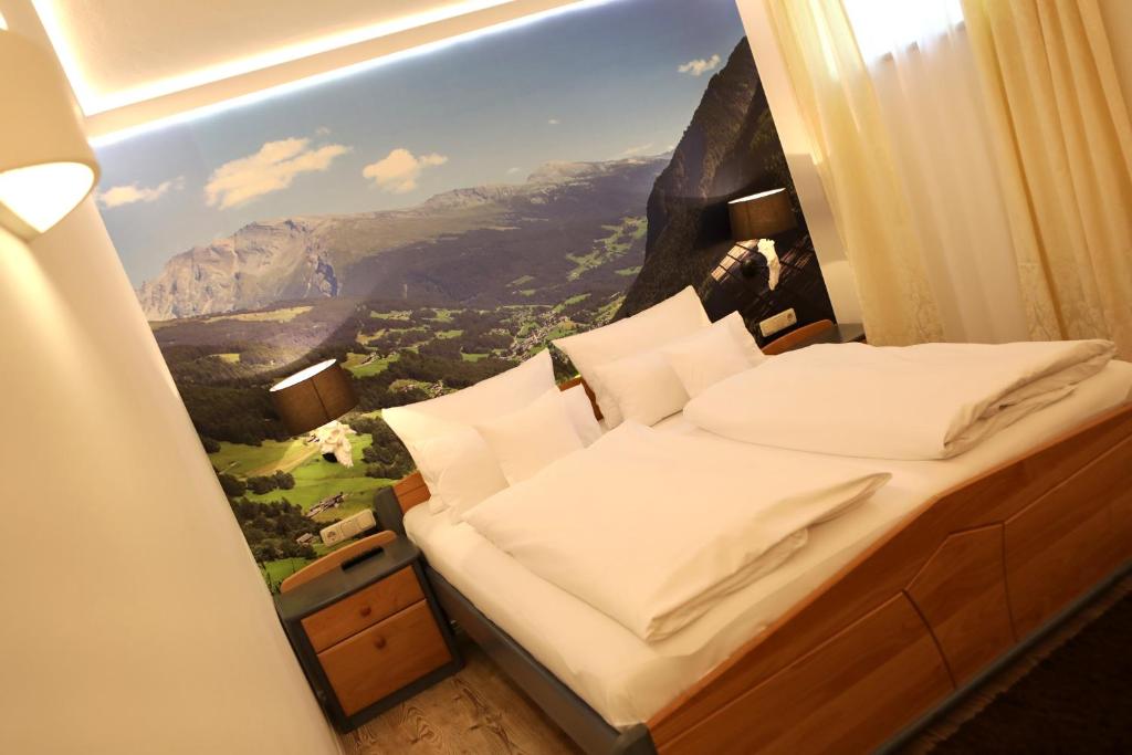Postel nebo postele na pokoji v ubytování Berghotel Hois