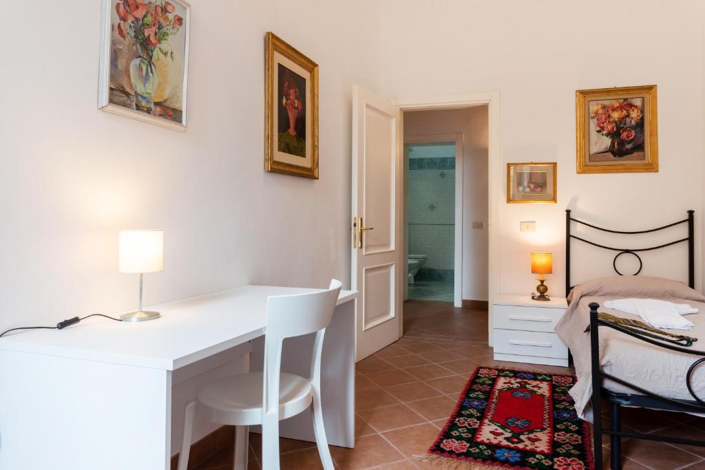Łóżko lub łóżka w pokoju w obiekcie Borgo Stretto Bright Apartments