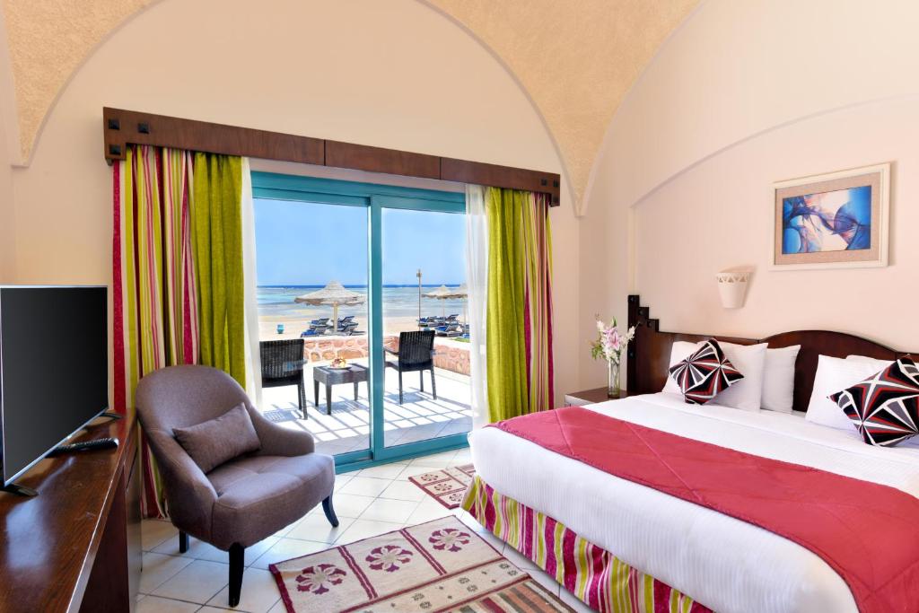 Postel nebo postele na pokoji v ubytování Swisstouch Resort ex Sentido Dream Marsa Alam