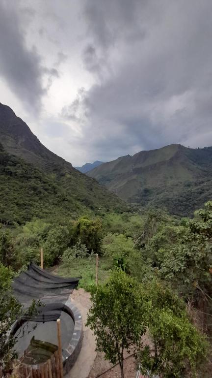 a view of a valley with mountains in the background at Colibamboo Ecolodge Biocasa artesanal rodeada de naturaleza con jaccuzi y mucho más in Pacho