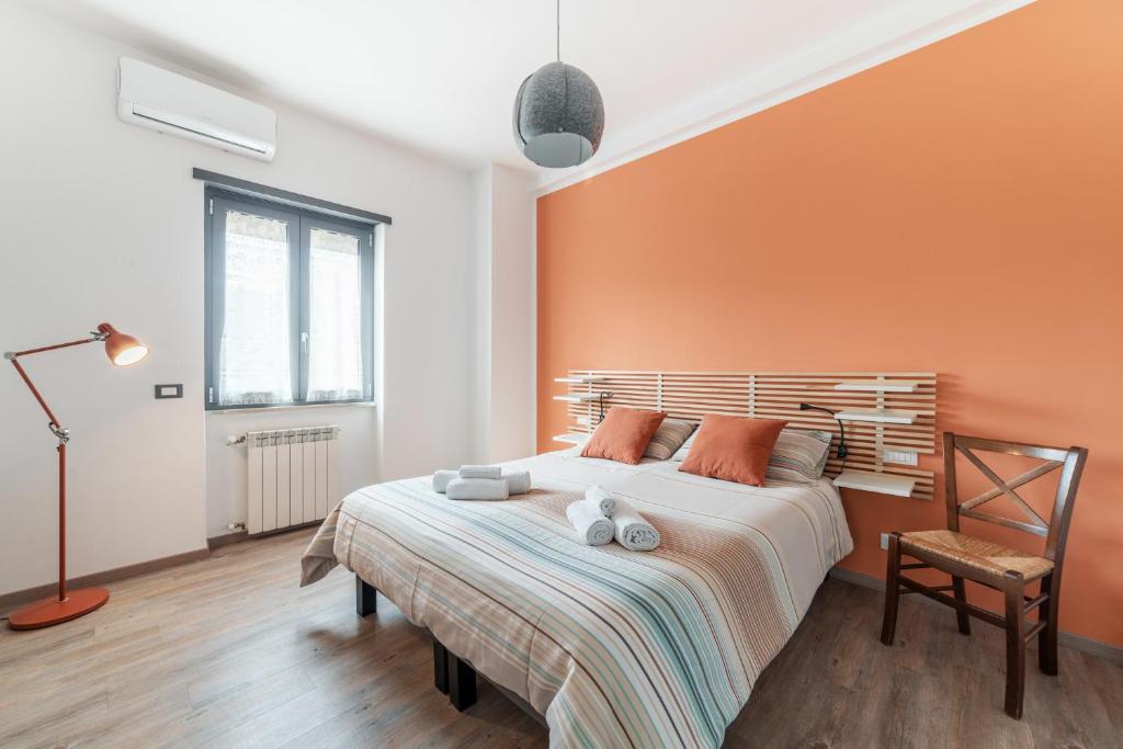 Łóżko lub łóżka w pokoju w obiekcie B&B Il Giardino di Gabri