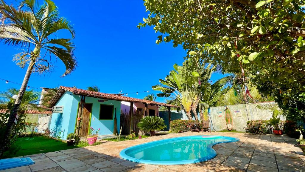 Swimmingpoolen hos eller tæt på Pousada Caravelas