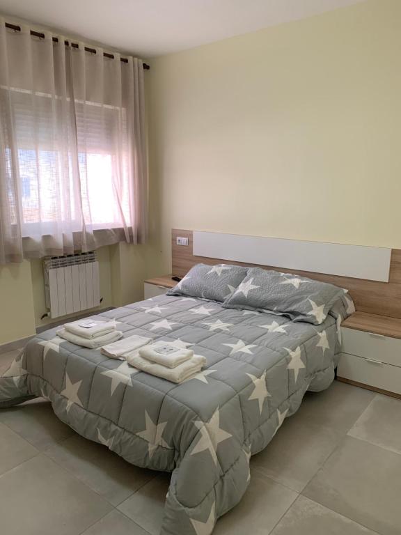 Posteľ alebo postele v izbe v ubytovaní La Villa Hostal