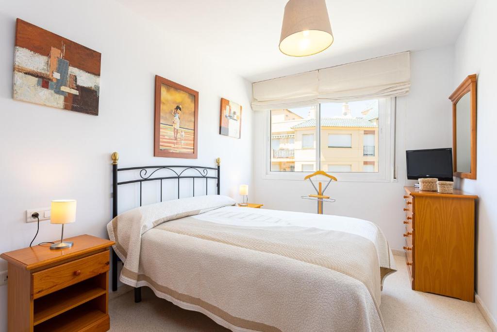 Łóżko lub łóżka w pokoju w obiekcie Apartamento El Recreo Torrox by Solset