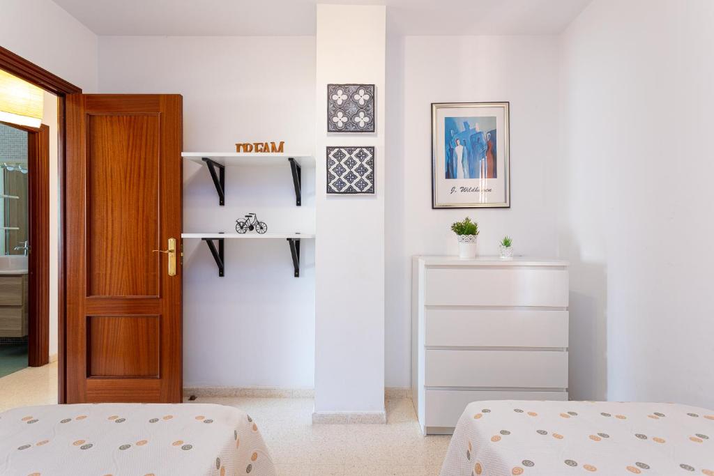 Łóżko lub łóżka w pokoju w obiekcie Apartamento El Recreo Torrox by Solset