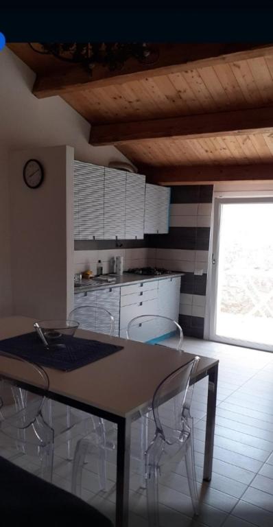 Kuchyň nebo kuchyňský kout v ubytování Residenza Cuntin