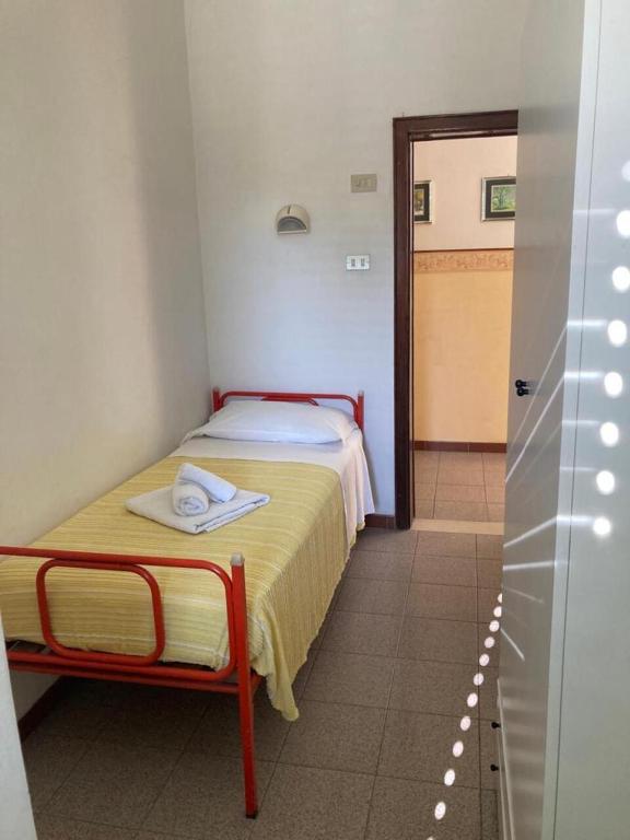 Postel nebo postele na pokoji v ubytování Hotel Villa Sorci