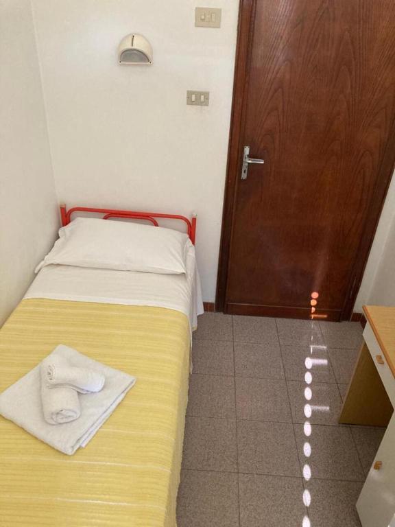 Postel nebo postele na pokoji v ubytování Hotel Villa Sorci