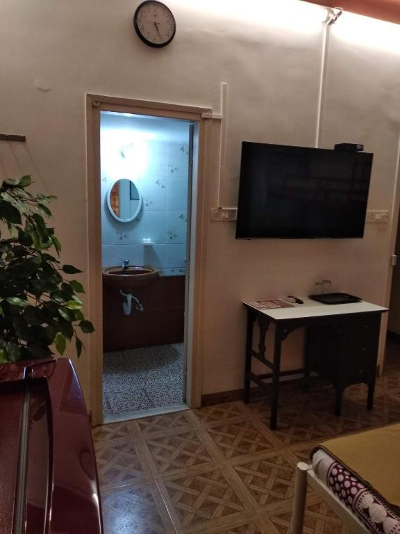TV a/nebo společenská místnost v ubytování Bis-LIN Home Stay