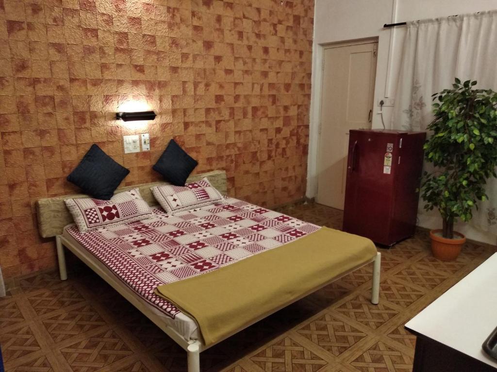 Postel nebo postele na pokoji v ubytování Bis-LIN Home Stay