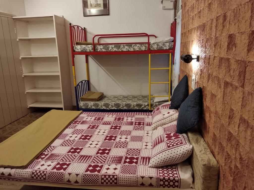 Postel nebo postele na pokoji v ubytování Bis-LIN Home Stay