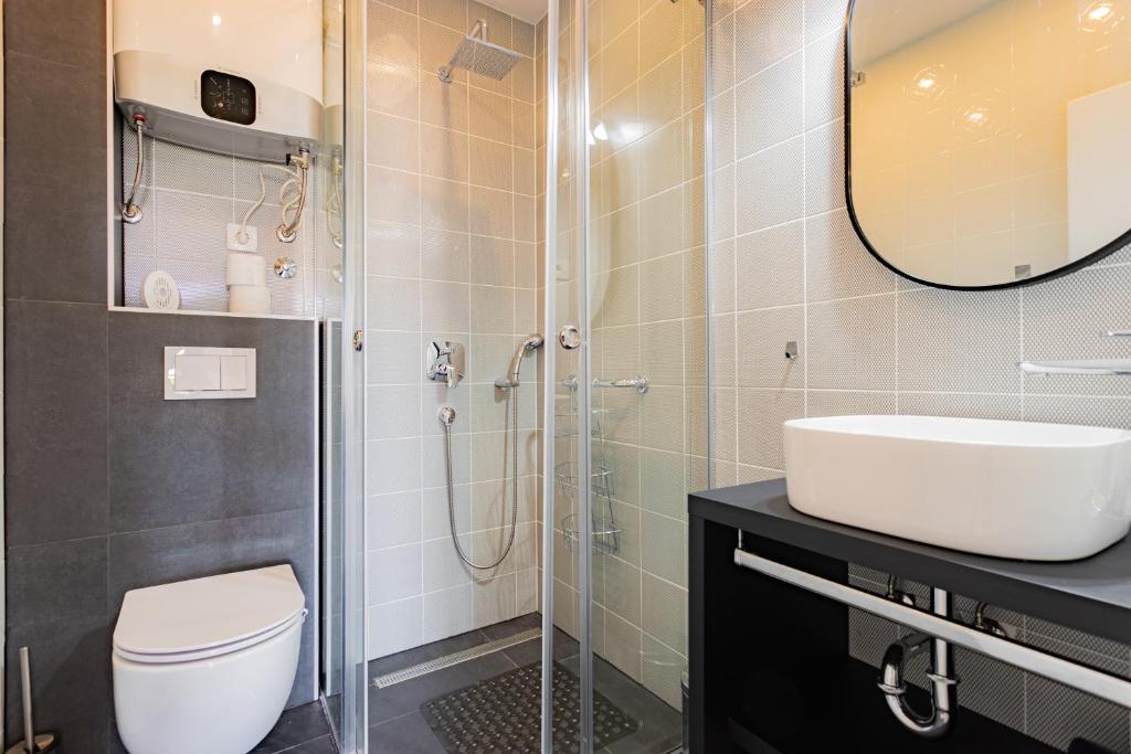 Kúpeľňa v ubytovaní Apartmani Benzon
