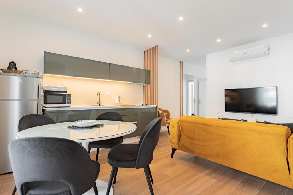 Kuchyňa alebo kuchynka v ubytovaní Apartmani Benzon